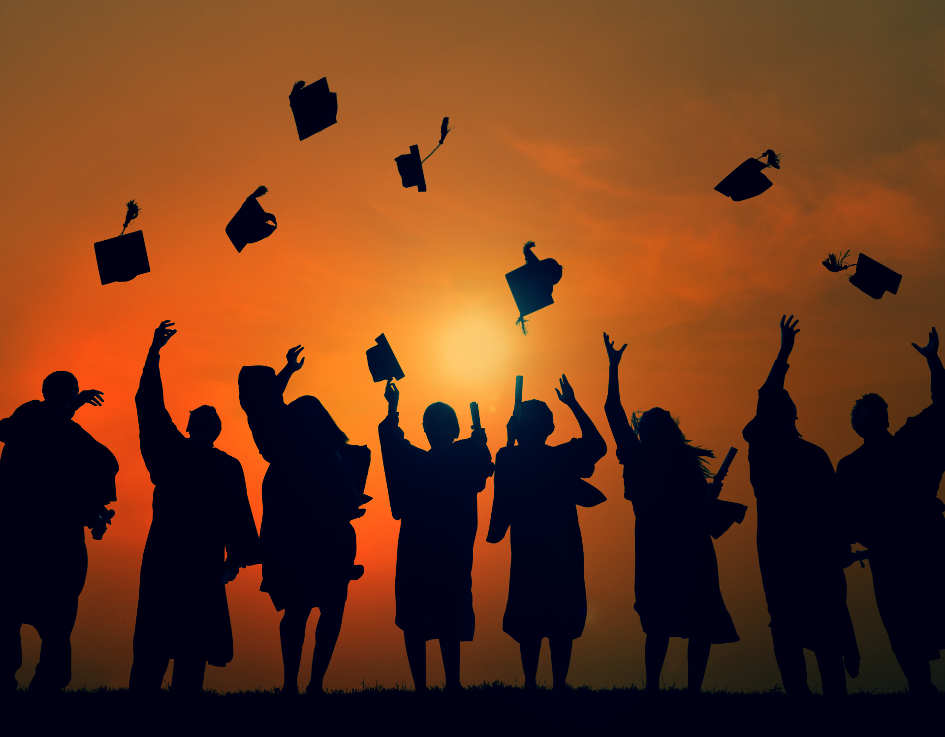 University graduates celebrating at commencement